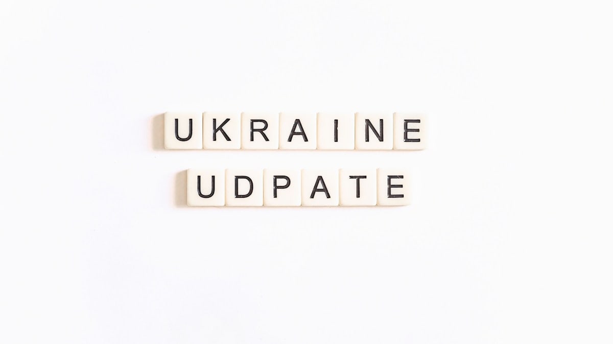 two scrabble tiles spelling ukraine and ukraine update